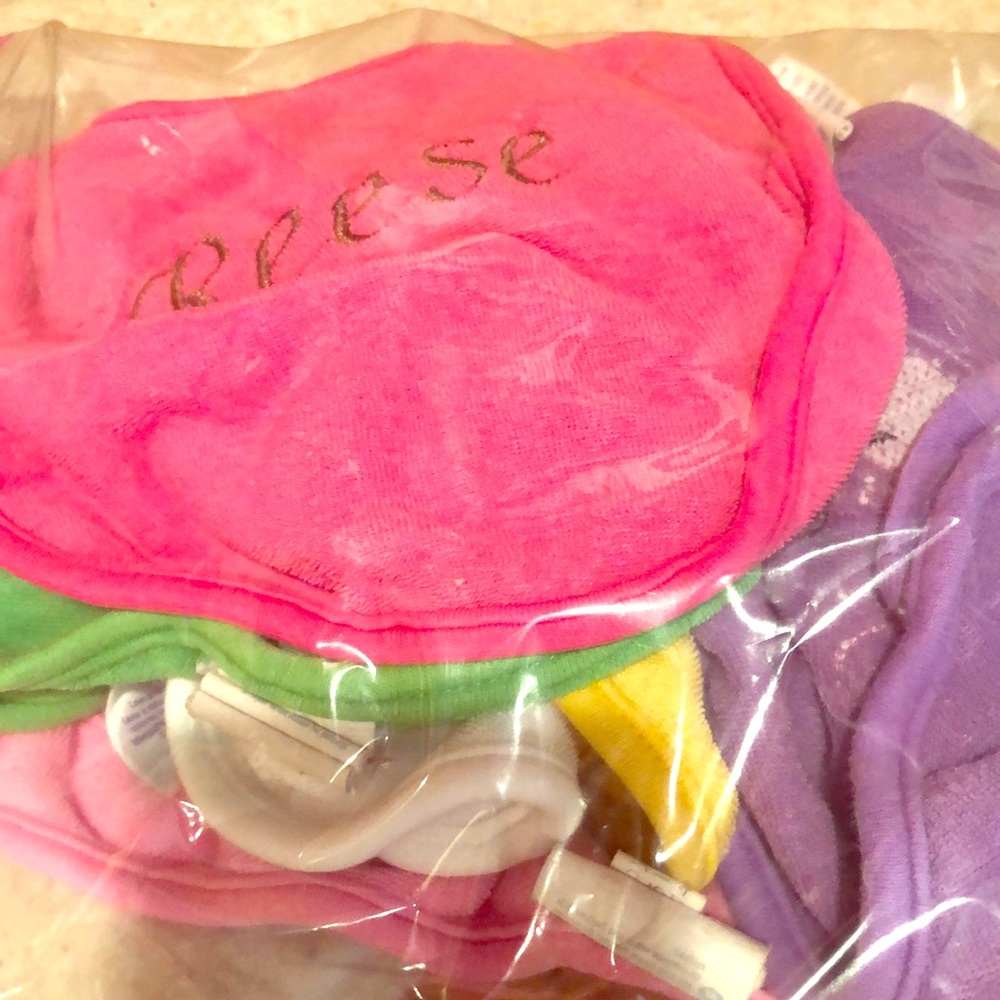 A bundle of baby bibs monogrammed Reese